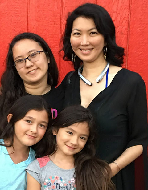 Jeanette Lee with her three daughters